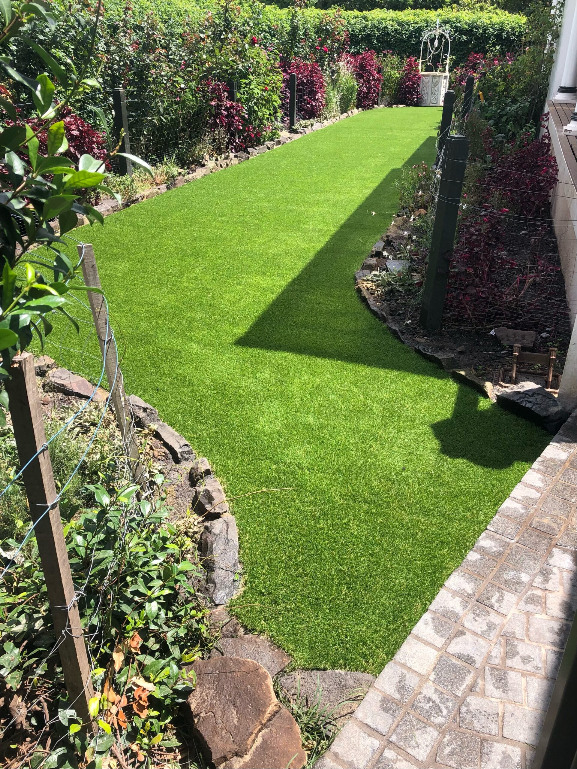 Premium artificial grass installation by Prestige Artificial Lawns